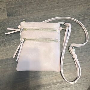 Baby pink purse with gold accents